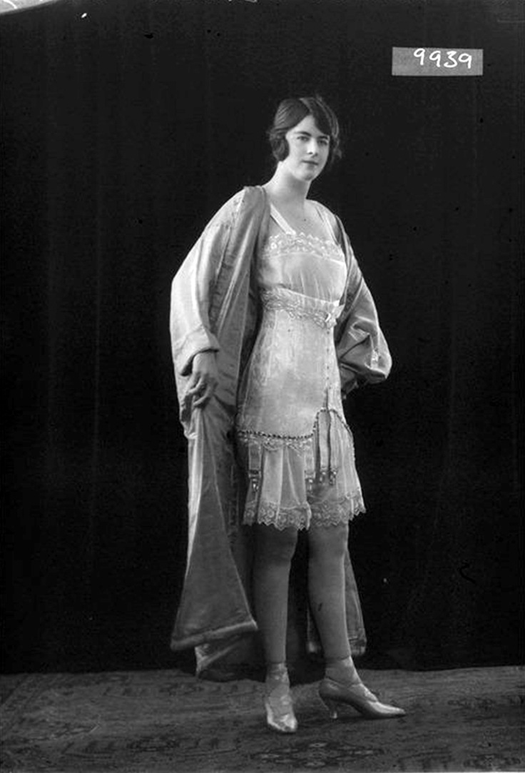 Glass Half Plate Image of a woman modelling a Mercedes corset for the stay and corset maker Miss Byron Corsets. Published in Ladies' Field. Maker: Bassano Studio Production Date: 1922-03-31
