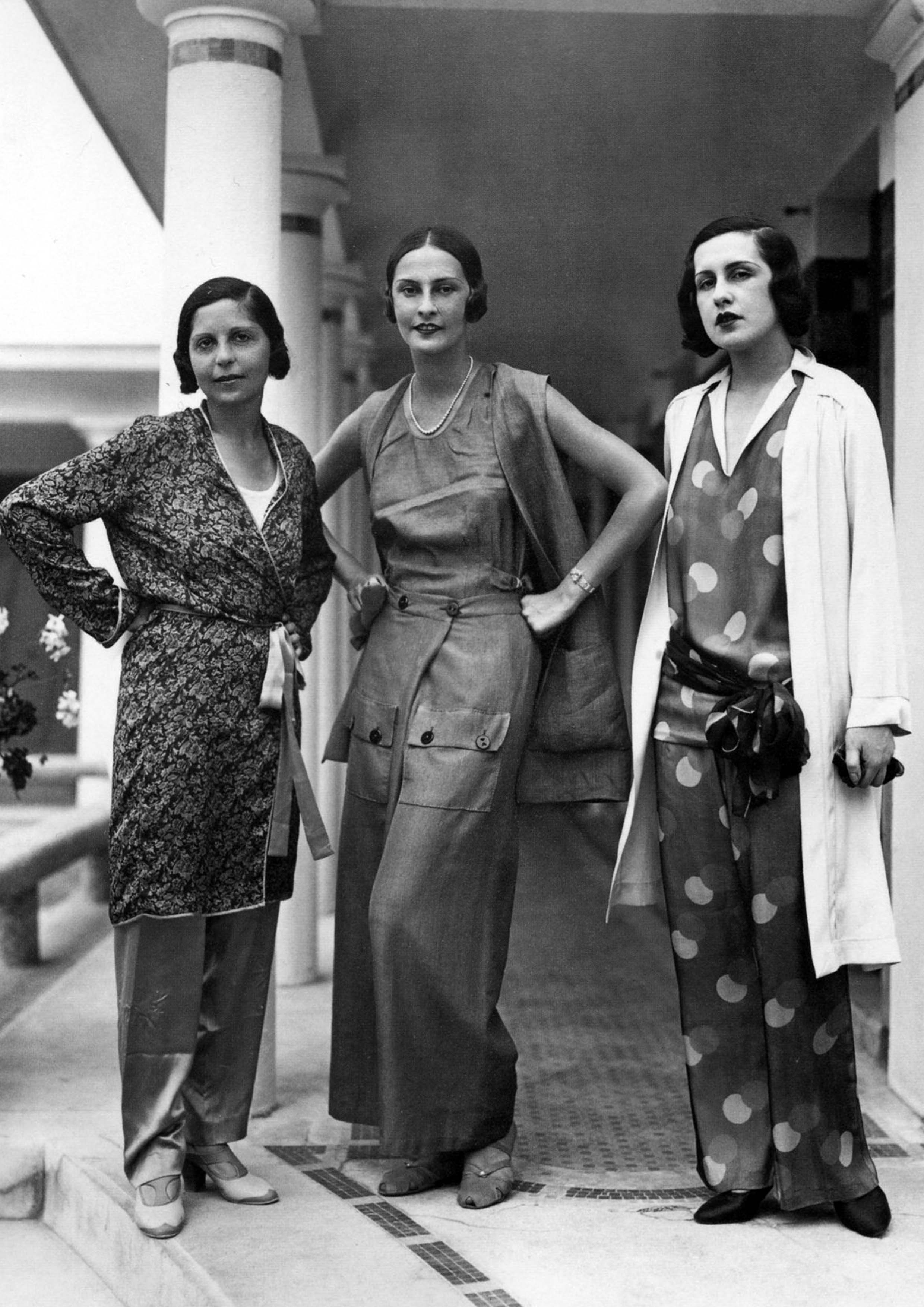 Two women from the 1920s both in mannish suits including wideleg trousers  a tie the jacket and hats  1920s fashion women 1920 women 1920s women